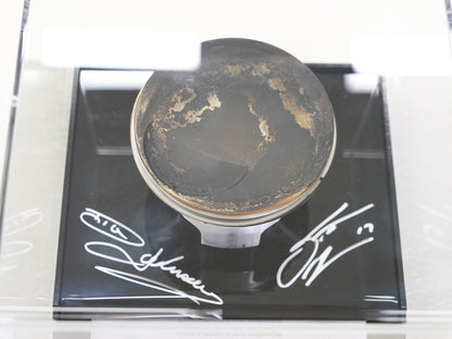 Championship-Winning Supercar Race Used Piston - signed by Dick Johnson and Scott McLaughlin