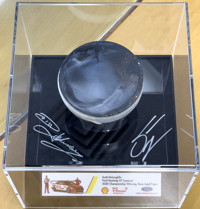2020 Championship-Winning, Race-Used Mustang GT Piston - signed by Dick Johnson and Scott McLaughlin