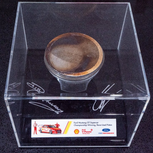 Championship-Winning Supercar Race Used Piston - signed by Dick Johnson and Scott McLaughlin